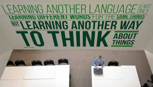 Huge wall sign in a study space, saying: 'learning another language is not only learning different words for the same things but learning another way to think about things'.